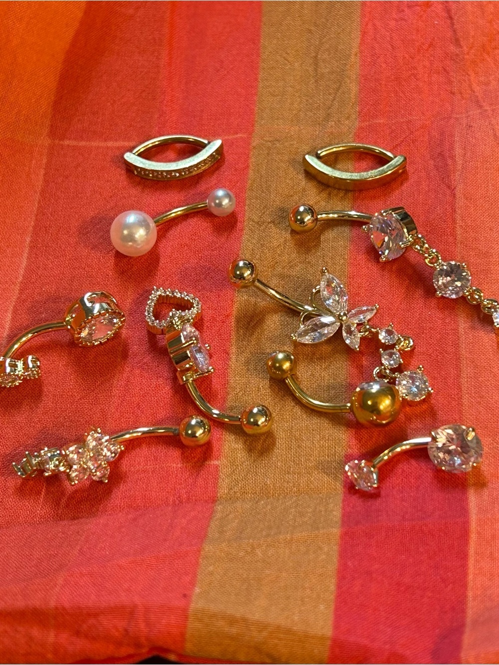 Bundle of 10 assorted gold Tone and Pearl belly button rings